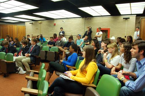 Students listen at the SGA debates Tuesday, April 4. The presidential and vice presidential candidates answer questions.