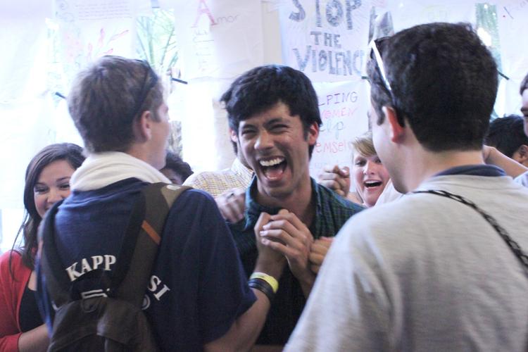 Music senior Michael Morin celebrates with his fraternity brothers after the announcement Friday, April 8, at CC’s. Morin defeated John Beverstock, finance sophomore, for the Student Government Association presidential position. 