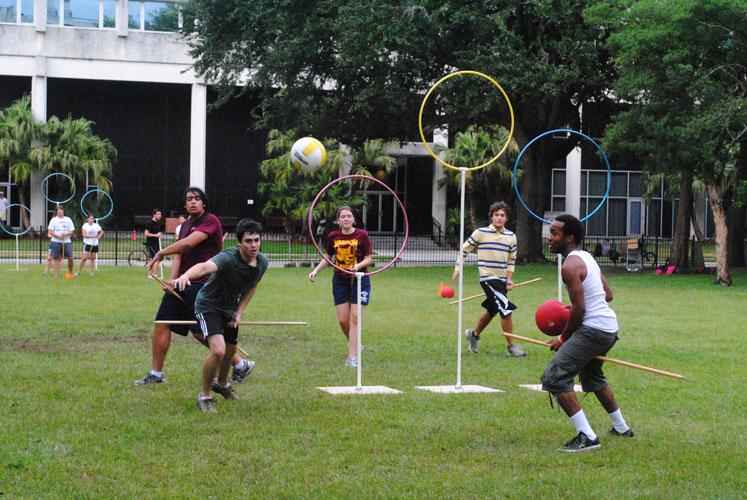 Members of the Loyola Quidditch Club practice in the Monroe Quad on Thursday, Sept. 22. Practices are held every Thursday from 5