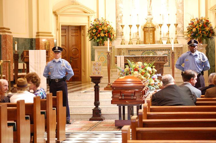 Guards stand near the coffin of Archbishop Phillip Hannan at Notre Dame Seminary. Loyola members were welome to view the body along with the rest of the public on Oct. 4 and 5.