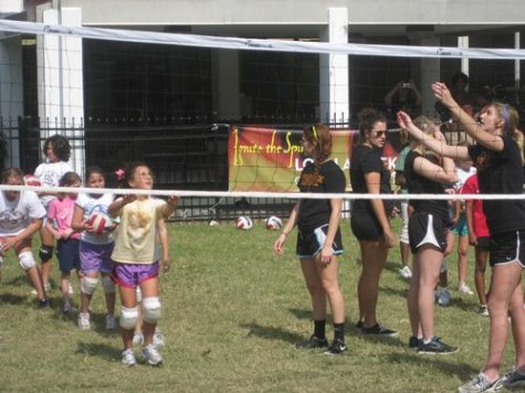 Members of the women's volleyball team spend the day with local Girl Scouts in the Residential Quad on Sunday. Oct 23.