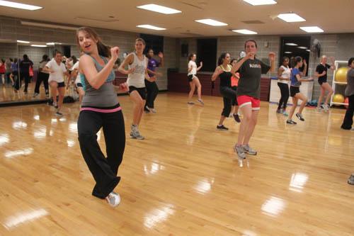 Tulane senior Jamie Revell instructs her Zumba class in the University Sports Complex on Wednesday, Nov. 30. Revell began instructing Zumba at Loyola after a conflicting schedule with Tulane’s aerobics program.