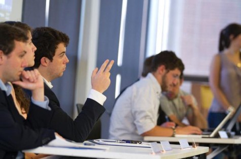 Michael Falotico, SGA vice president, raises his hand to address a concern at the weekly SGA meeting Wednesday, April 25.