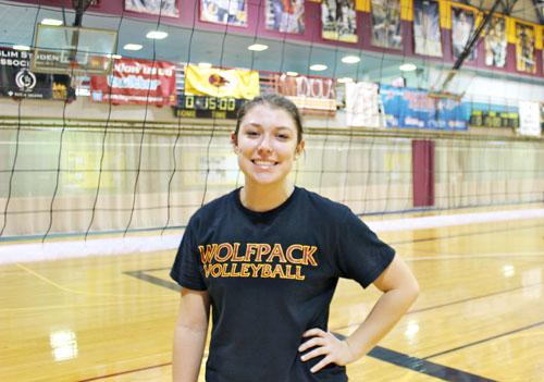 Environmental science sophomore Becca Burnett poses for a photo after practice. Burnett has moved to the libero position for this season.