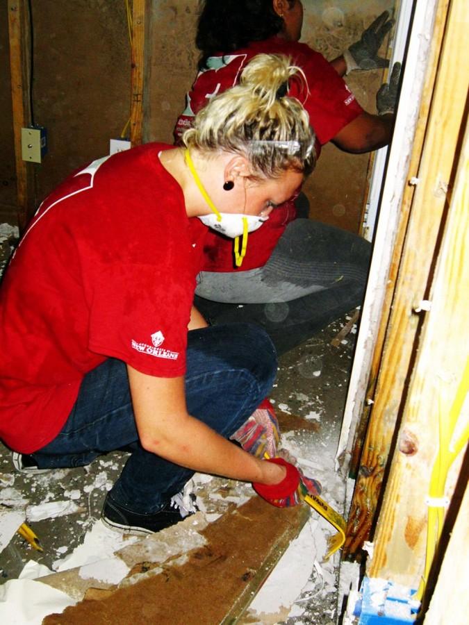 Merel+Adrichem%2C+a+foreign+exchange+student%2C+works+to+tear+up+dry+wall+and+replace+carpet+in+a+home+located+in+LaPlace%2C+an+area+heavily+affected+by+Hurricane+Isaac.+LUCAP+partnered+with+Catholic+Charities+to+restore+homes+damaged+by+Hurricane+Isaac.