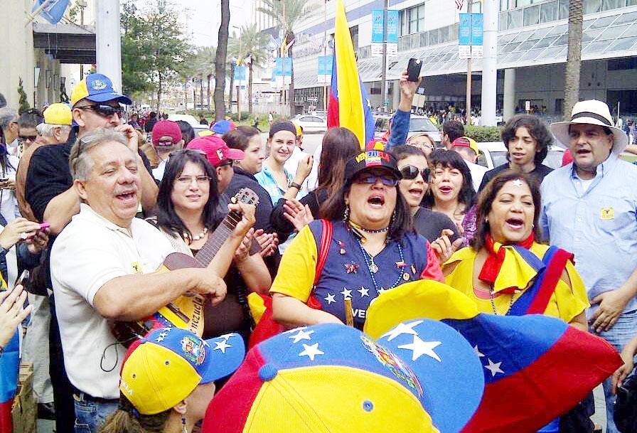 Venezuelans+play+music+and+sing+to+celebrate+casting+their+vote+for+the+country%E2%80%99s+presidential+election+at+the+convention+center+in+New+Orleans+on+Oct.+7