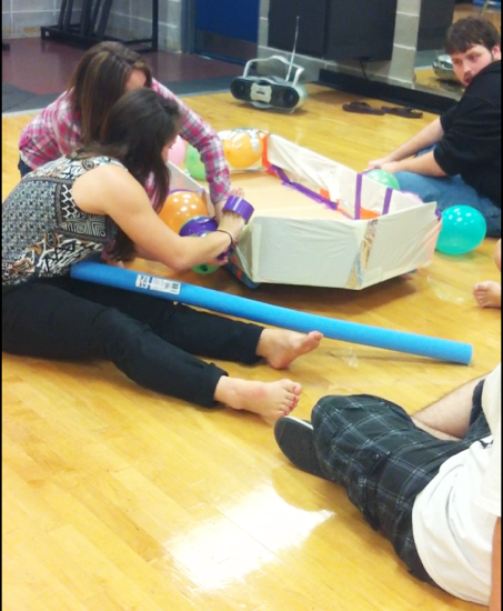 Loyola students participate in building boats out of scraps at the recent Loyola Late Night Event. This event provides students with non-alcohol related activities on the weekends. 