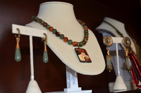 Owner Sarah Celino's handmade jewelry on display at Bella & Harlow. Using beads and pendants she finds around the city, Celino creates earrings and necklaces which she sells in the shop.