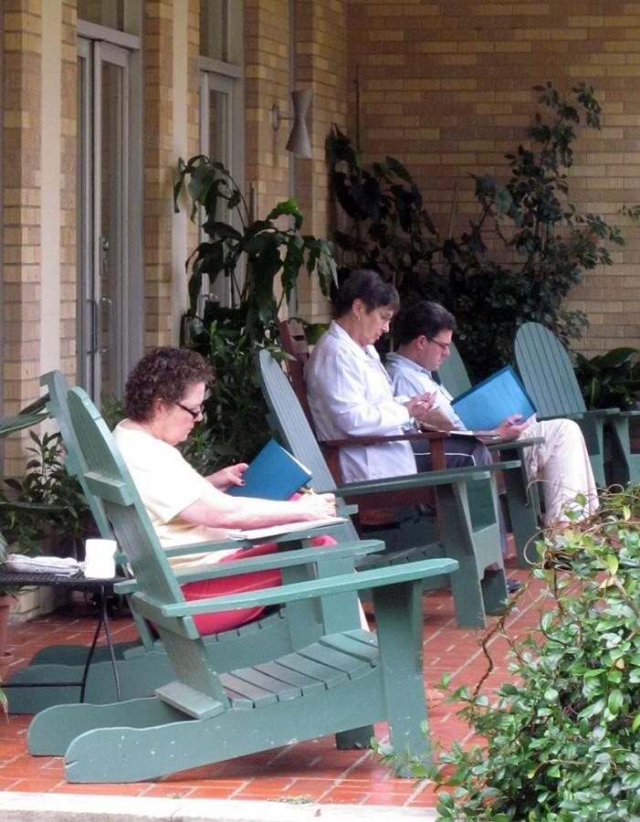 Dean’s assistant Michelle Davis, Joan Shell and Dr. John Sebastian praying and reflecting at the Carmelite Spirituality Center.