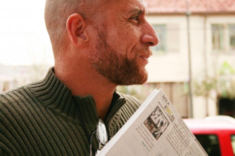 Calvin Bernard distributes The Exchange outside of a store on St. Charles Avenue. The Exchange is a street paper that concentrates on social issues in New Orleans and is distributed through the use of vendors.