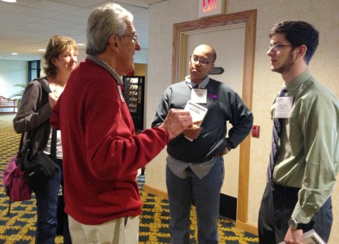 Philosophy senior Joshua Washington and philosophy sophomore Andrew Vincent discuss French philosophy with Professor Emeritus of philosophy at Denison University, Ronald Santoni. The American Philosophical Association conference hosted over 200 academic seminars and presentations by influential university educators.