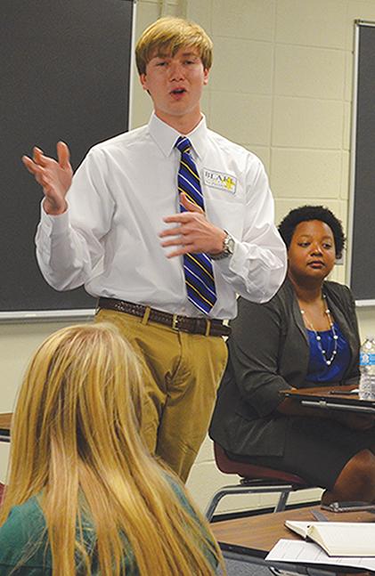 Newly elected SGA vice president Blake Corley debates with other candidates at the SGA debate on March 14.   Voting was held over the next two days, and Corley’s victory was announced the next week.  