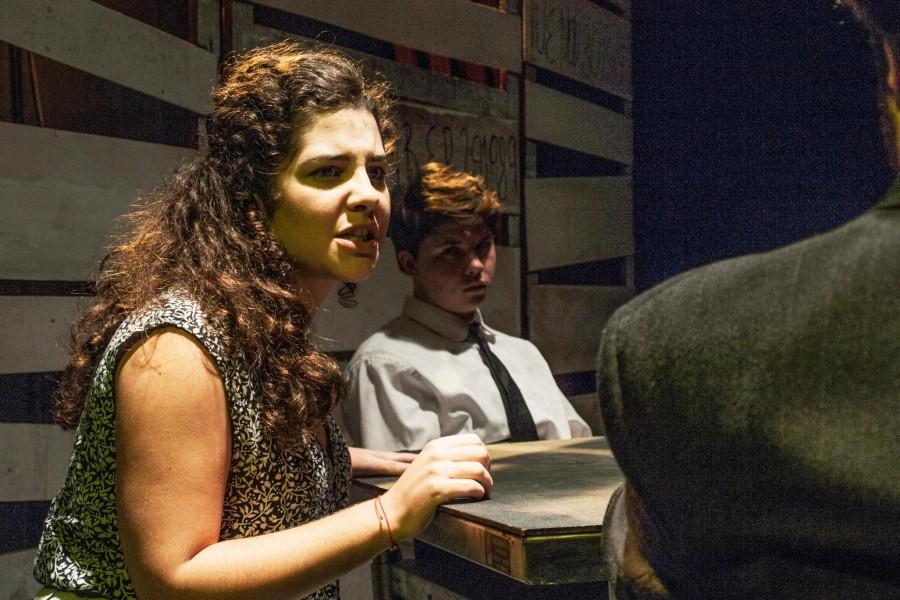 Alina Gordillo, theatre arts sophomore, is interrogated by a police officer, jazz studies junior Miles Crabtree, in “The Witness”. The play is a one-act directed by theatre arts senior Rachel Christian and tells the story of the six Jesuits murdered in El Salvador by U.S. trained soldiers.