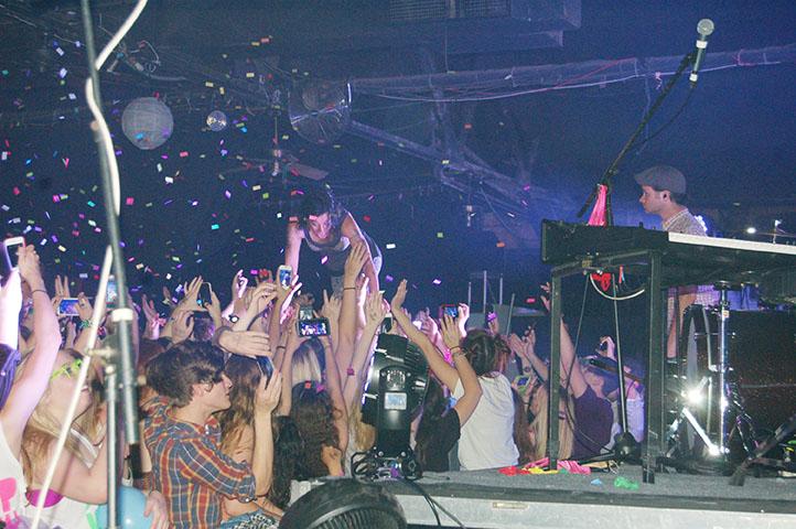 Kim Schifino, of Matt & Kim, crowdsurfs over a group of concert attendees during Loup Garou at the Howlin’ Wolf. Loup Garou is an annual spring concert put on by the University Progamming Board.