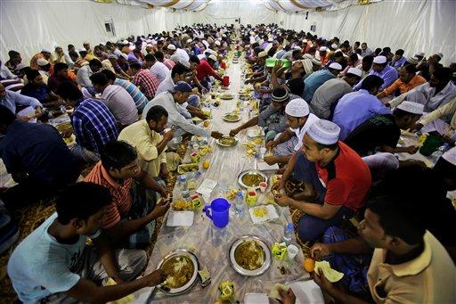 Muslims in Dubai, United Arab Emirates gather for the final days of Iftar dinner for the celebration of Eid. Ramadan requires Muslims to fast from eating, drinking and smoking from sunrise to sunset.