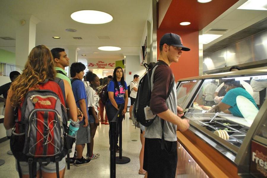 Students stand in line for new dining options in the Danna Student Center. 