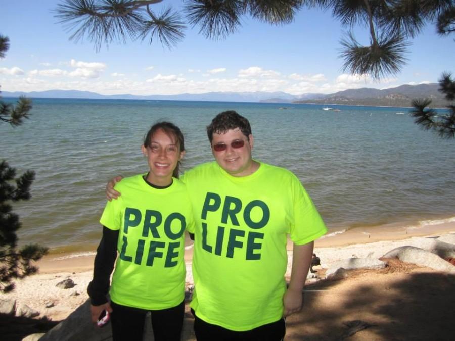 Religious studies senior Chad Aubert and (right) fellow Crossroads participant pose in San Francisco. Pro-life individuals walked from San Francisco to Washington, D.C., between May 18 and Aug 9.