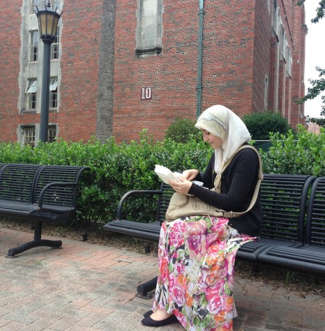 Farah Alkhafaf, psychology freshman, eats lunch during the Tuesday window. Alkhafaf is a Muslim originally from Iraq. 