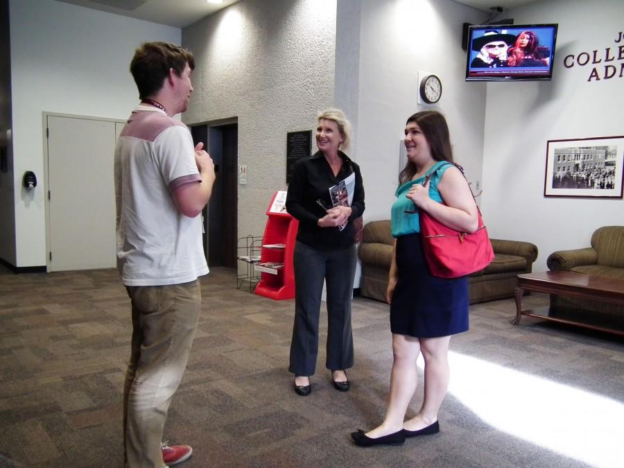 Django Szilgi, student ambassador and psychology sophomore, gives a tour of the Joseph A. Butt College of Business to a prospective student and mother.  Ambassadors give tours twice a day at 11