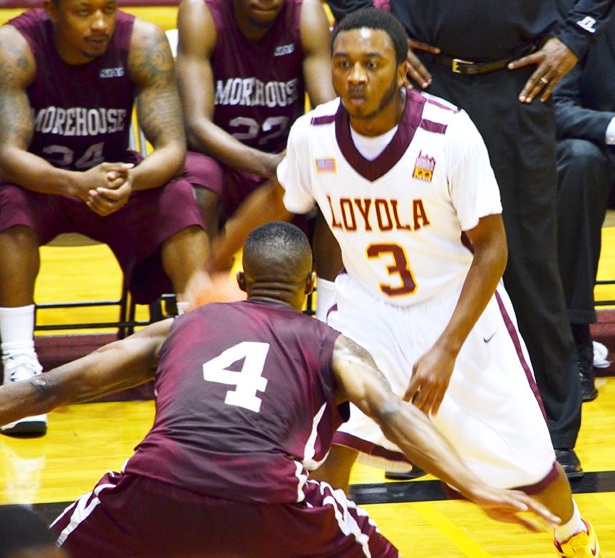 Finance sophomore Jared Townsend dribbles near the perimeter in a game against Morehouse last season.  Loyola was 16-14 overall last season. 