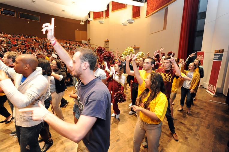 Students+from+different+organizations+dance+to+the+Loyola+song+in+Roussel+Hall.+Fall+Open+House+was+a+recruiting+event+to+allow+prospective+students+to+visit+campus+that+happened+on+Saturday%2C+Nov.+16.