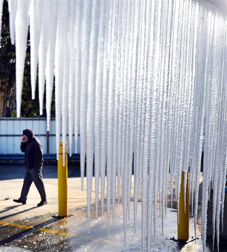 New Orleanians woke up to temperatures in the 20s on Tuesday, Jan. 7, 2014. On South Claiborne Avenue, carwash owner John LaGuardia arrived at work to find his business covered in four foot long icicles. 