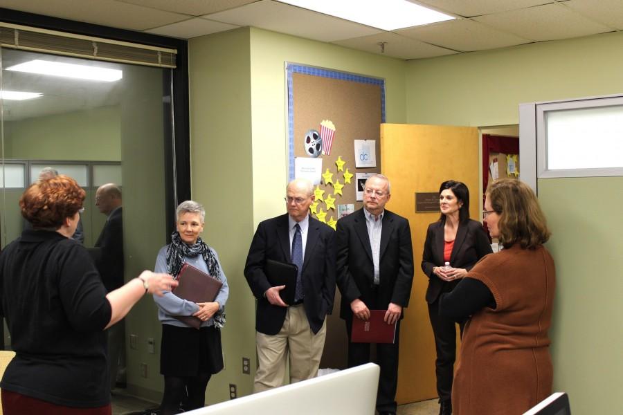 Sonia Duhe, director of the School of Mass Communication, gives accreditors from the Accrediting Council for Education of Journalism and Mass Communication a tour of the school. The school is seeking official certification through the council.
