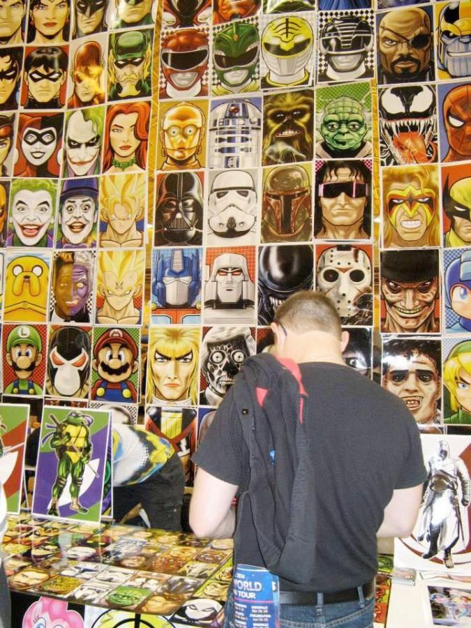 A New Orleans Comic Con attendee browses through a selection of posters. Lovers of science fiction and comic books packed the Ernest N. Morial Convention Center for the event from Jan. 7 through Jan. 9. 