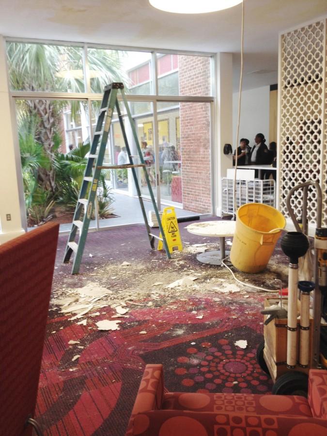 Debris lays on the floor of the Danna Student Center after part of the ceiling fell away. University officials say the damage was a result of asbestos in the structure of the building.