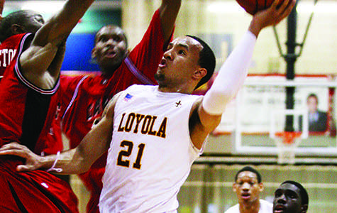 Loyola basketball star returns as a new coach