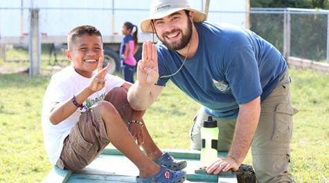 Baseball team serves and scores during Belize service trip