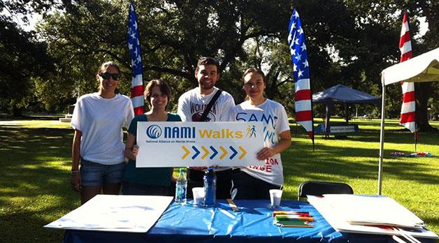 Lexa Lake, psychology senior, Brandi Wozniak, music therapy senior, Agustin Crespo, criminal justice senior, and Destiny Simms A’14  volunteer at the 2013 National Alliance on Mental Illness walk. Student Advocates on Mental Illness is a LUCAP project that works to raise awareness about mental illness and tries to erase the stigma attached to it. 