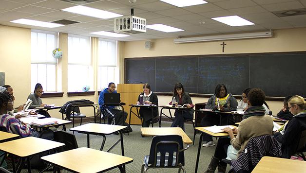 Students engage in  group discussion during a psychology class at Xavier University. The univeristy unveiled the city’s first clinical psychology doctorate program.