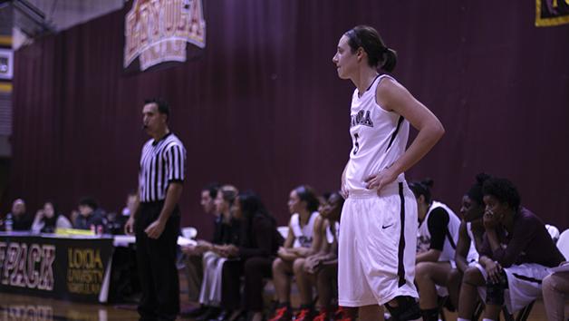 Rebekah Greer, psychology senior, waits on the sideline to enter the game. The women’s basketball team is looking to continue their success from the regular season into this year’s conference tournament. 