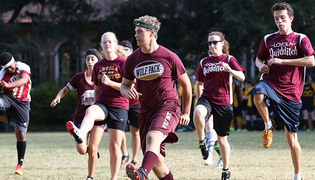 The Loyola quidditch team warms up before a weekend tournament. The team has now qualified for the Quidditch World Cup in Rock Hill, South Carolina and are looking to make a serious statement in the championship tournament.