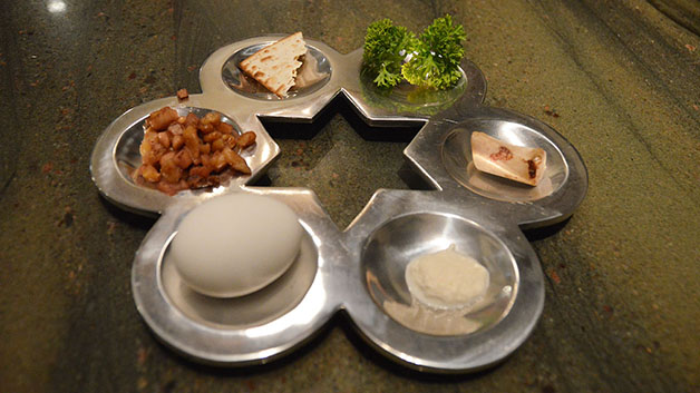 The Seder meal consists of different foods that represent elements of Jewish history. This meal is traditionally eaten on the first night of Passover and meant to provide a link to Jewish ancestors. 