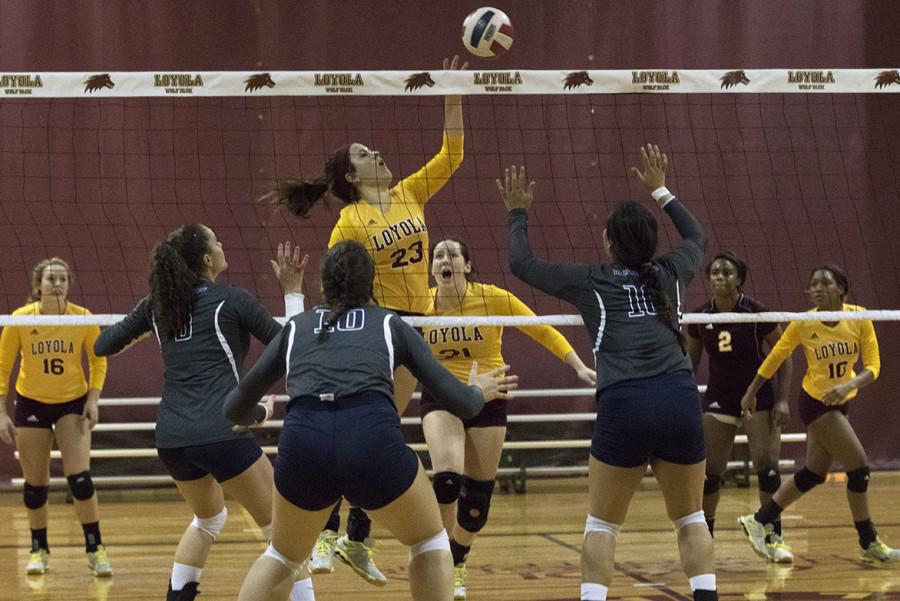 Maddie Heukels, english freshman, goes for a spike in a game against Alcorn State on Wednesday, Sept. 9. The Pack will hit the road on Friday, Sept. 18 to take on Coastal Georgia, which is the number two team in their respective conference. Photo credit: Zach Brien