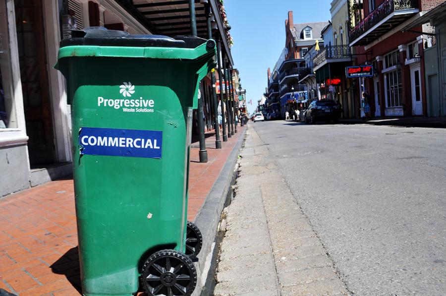 A+recycling+can+sits+on+the+curb+on+Bourbon+street+in+the+French+Quarter.+Businesses+in+the+French+Quarter+can+now+recycle+glass.+Photo+credit%3A+Andrew+Callaghan