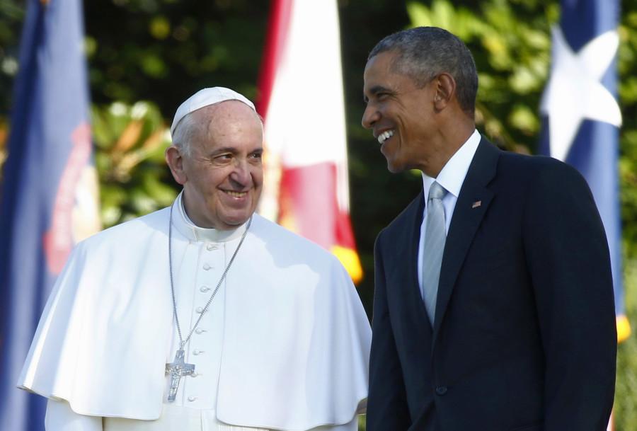 President Barack Obama talks with Pope Francis during a state arrival ceremony on the South Lawn of the White House in Washington, Wednesday, Sept. 23. The Pope will depart for Rome on Sept. 27. (Tony Gentile/Pool Photo via AP)