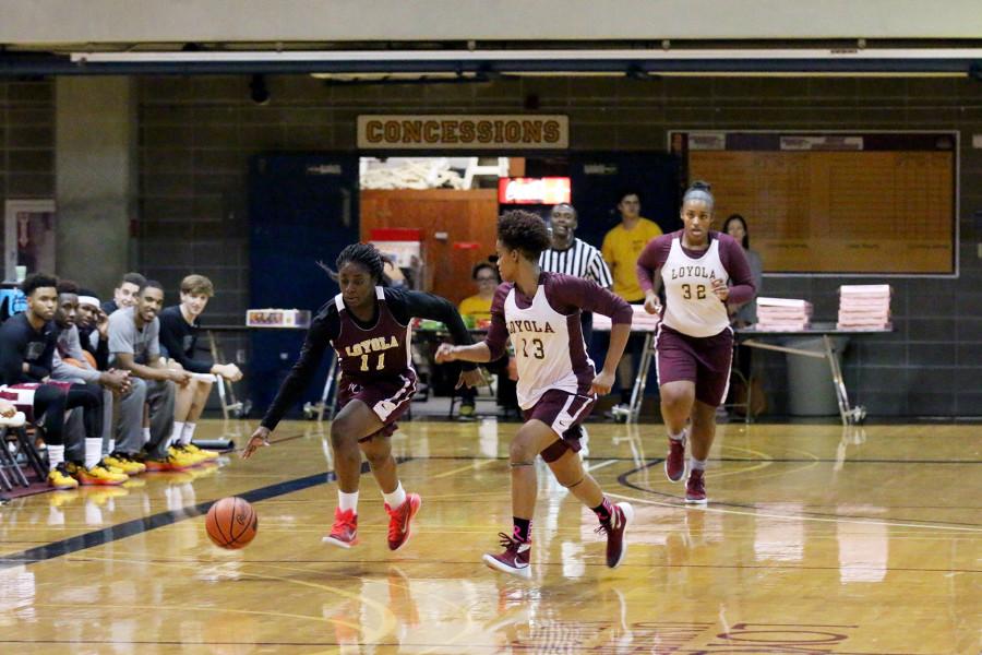 Senior forward Adrianne Solboh, left, drives down the court while being guarded by redshirt junior guard Brianna Oglesby during the womens scrimmage at Fan Fest on Thursday in the Den. The event featured scrimmages by the mens and womens basketball teams, a three point competition and crowd activities.