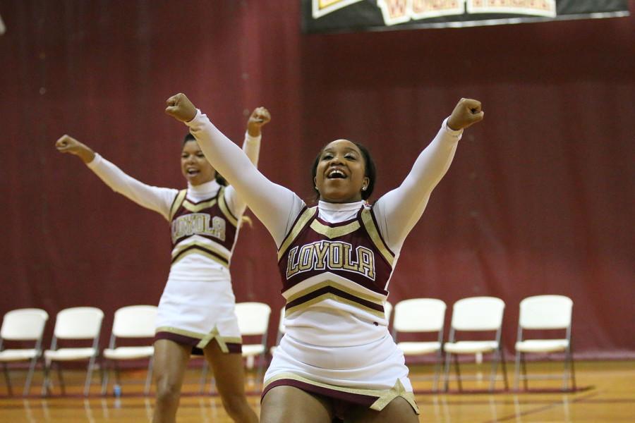 The Loyola cheerleaders perform at Fan Fest on Thursday in the Den. The event featured scrimmages by the men's and women's basketball teams, a three point competition and crowd activities.