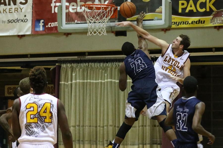 Marcel Hawkins, Dalton State junior forward, blocks a dunk attempt by Nate Pierre, Loyola junior center, in the second half of their game in The Den on Jan 2, 2016. Loyola fell to SSAC rival Dalton State 70-67 despite outscoring them in the second half 37-35.