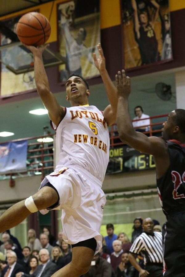 Loyola junior guard shoots a fall away jump shot in the first half of their game against William Carey University in the Den Jan 23, 2016. The men lost 71-83 to SSAC rival William Carey, who ranks first in the conference.