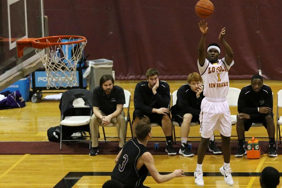Nick Parker, Loyola sophomore guard, sinks a three point shot in the first half of their game against SSAC rival Bethel University. Parker scored 40 points, an SSAC season-high, en route to a 84-79 victory for Loyola's men's basketball team, their last home game of the season.