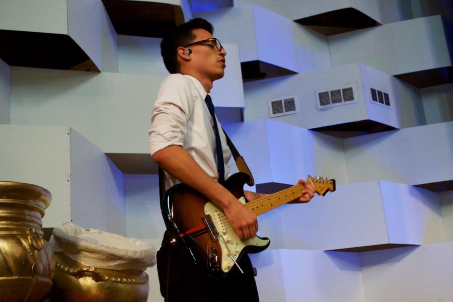 David Lopez plays guitar during Iglesia de Dios Getsemanis 2016 Primicias celebration. Lopez has been a musician in the ministry department for three years. Photo credit: Victor Hugo