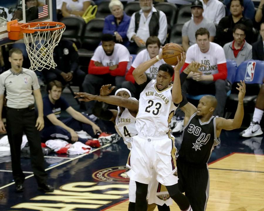 Anthony Davis grabs one of his 13 rebounds in their game against the Spurs. The Pelicans fell to the Spurs 94-86.