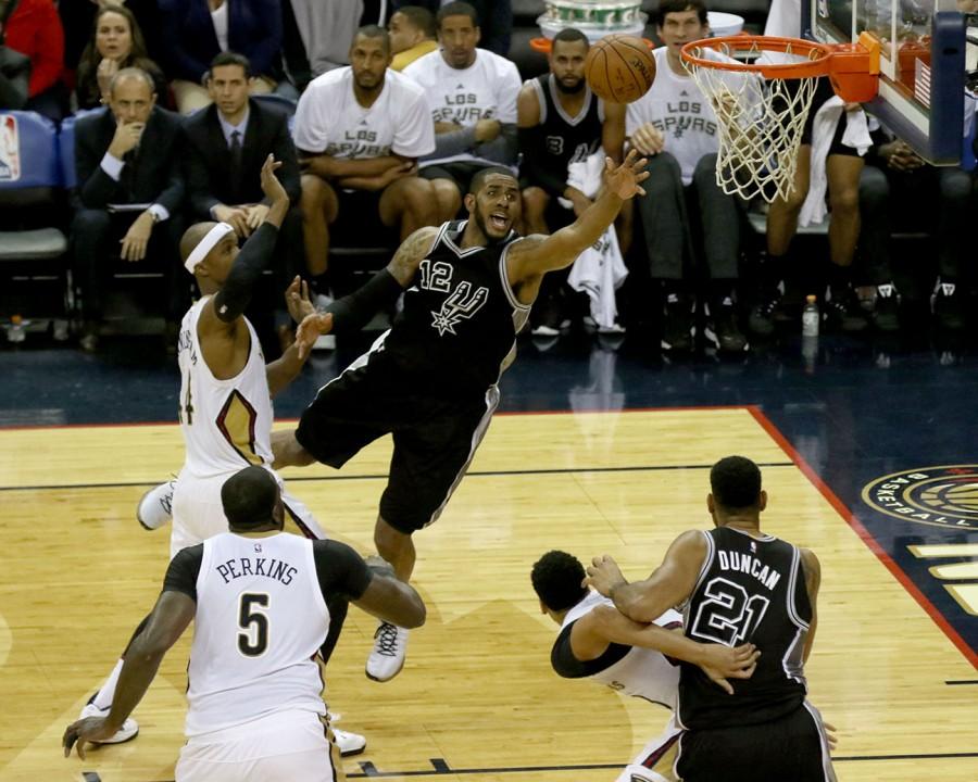 LaMarcus Aldridge shoots the ball falling away in the second half. Aldridge finished with 26 points in a 94-86 victory.