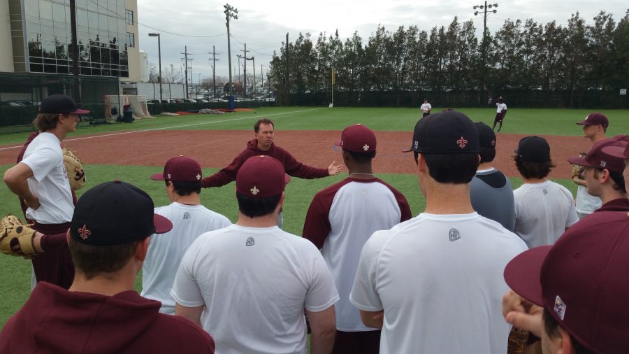 Doug Faust, head coach, addresses the Loyola baseball team at a team practice at Segnette Field. The baseball team has a record of 18-25 on the season and plays their next game in Mobile, Alabama against the University of Mobile on April 15 at 6 p.m.