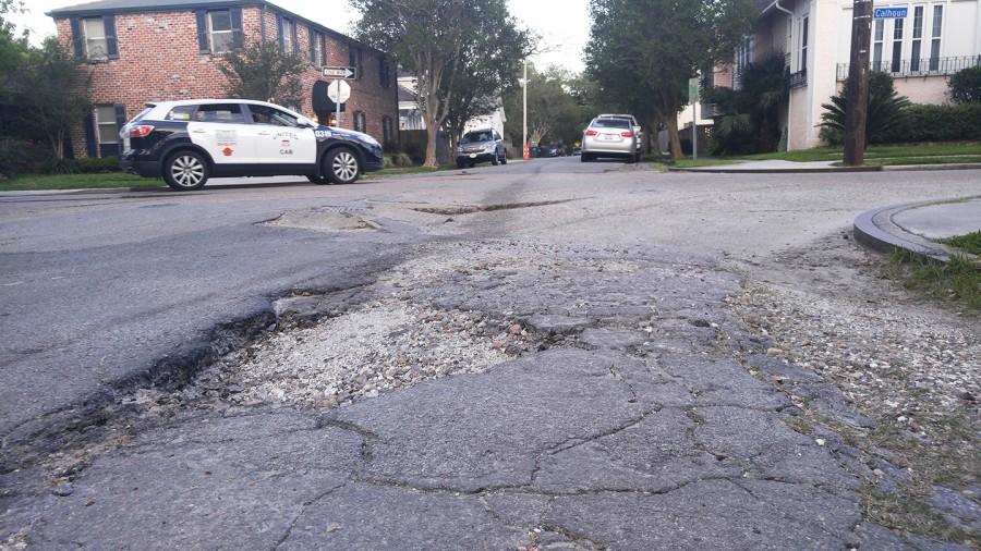 Potholes like the one shown above are littered around the streets of New Orleans, often causing expensive car repairs and unattractive streets. Fix My Streets Working Financial Group aims to work with the city to make smooth streets in New Orleans. 