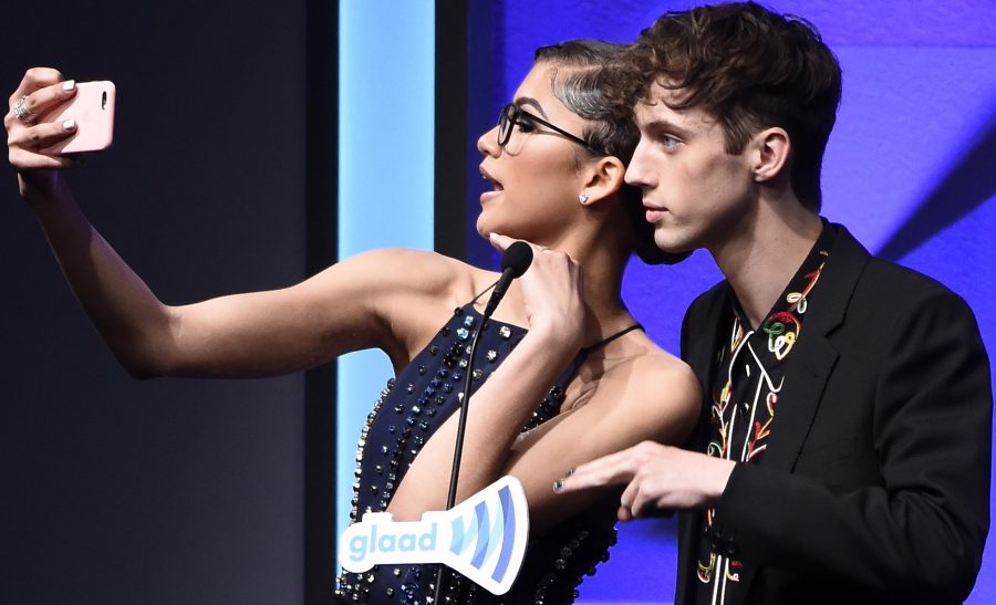 Presenters Zendaya and Troye Sivan take a selfie together onstage during the 27th Annual GLAAD Media Awards at the Beverly Hilton on Saturday, April 2, 2016, in Beverly Hills, Calif. Sivan won the award for Outstanding Music Artist, given to one person every year.